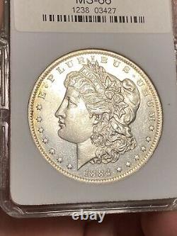 1884 O Morgan Silver Dollar NGC MS 66 Cracked