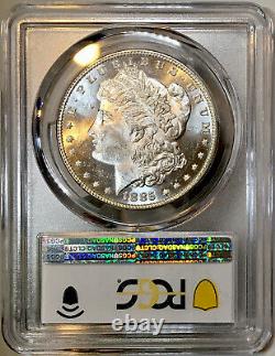 1885-P Morgan Dollar PCGS MS63 Lustrous Glass Like End Of Roll Rainbow Toned