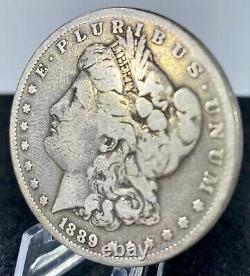 1889-CC Key Date Morgan Silver Dollar in F/VF Condition You Decide! Bid Now