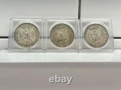 Three Morgan Silver Dollars