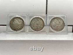 Three Morgan Silver Dollars